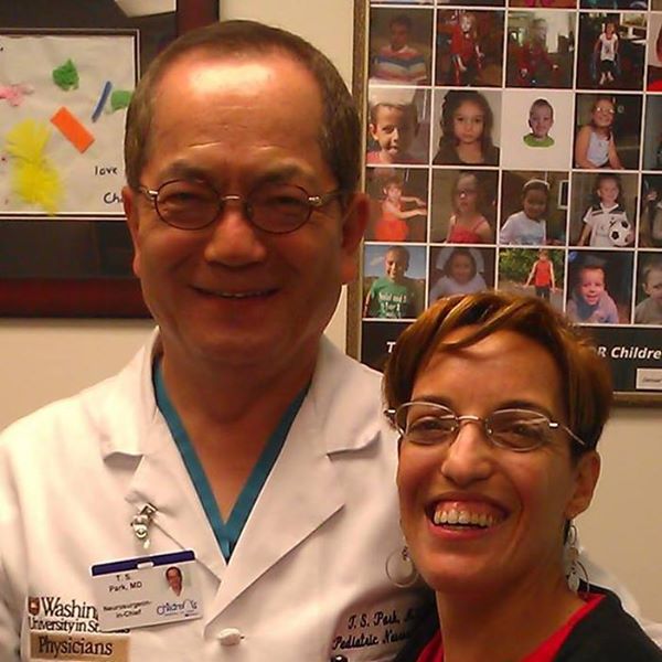 Dr. Park and me at my four-month evaluation after SDR.